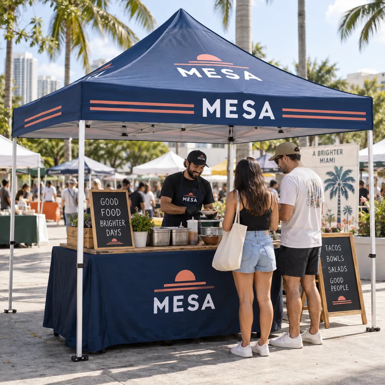 MESA branded 10 by 10 foot canopy serving customers at an outdoor market