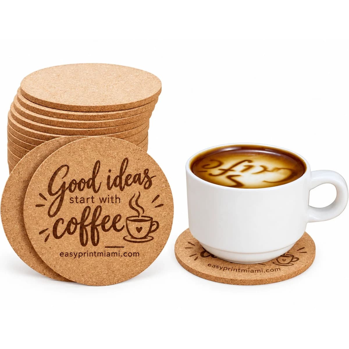 Laser engraved cork coaster with business branding beside coffee