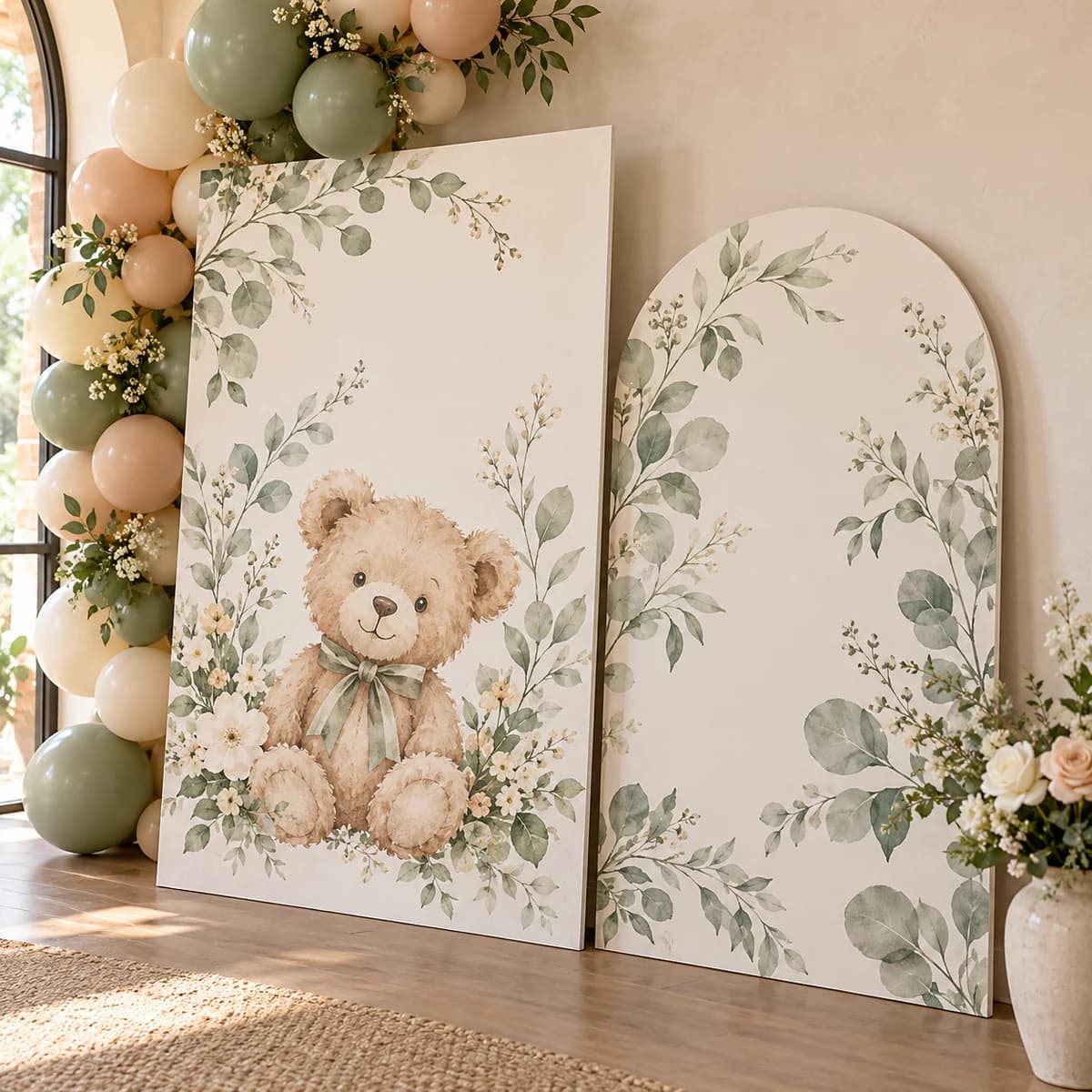 Flat printed foam board panels leaning against a wall at a baby shower, without bases