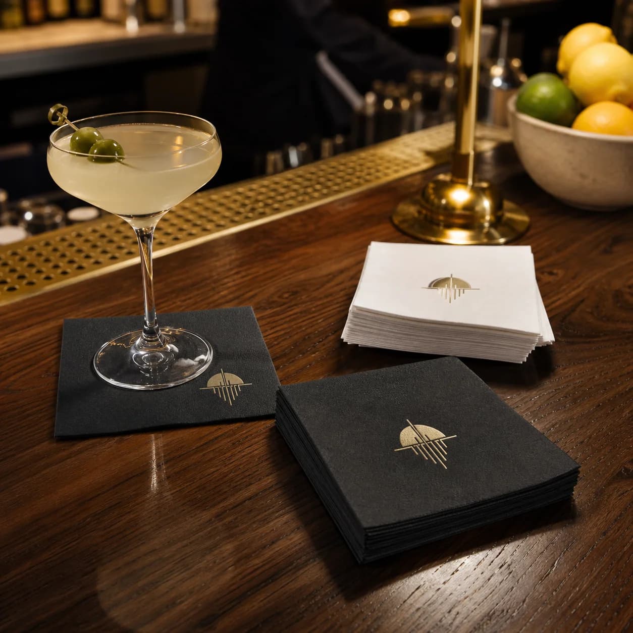 Black and white custom cocktail napkins branded for restaurants, bars, and hospitality