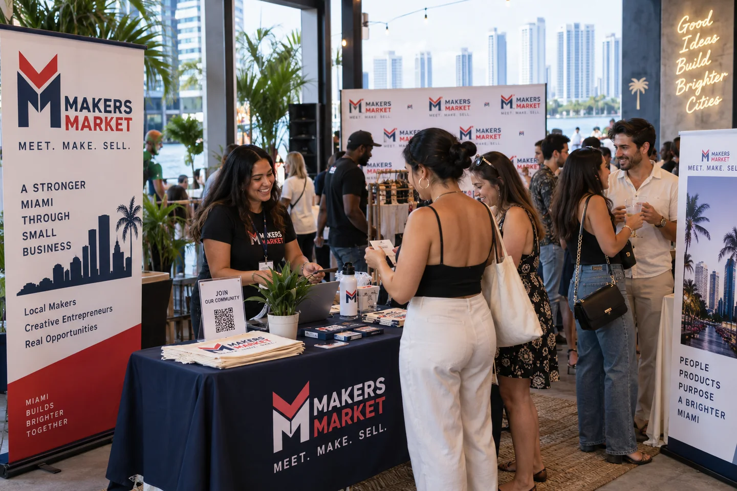 Makers Market event with branded banners, backdrop, and table cover
