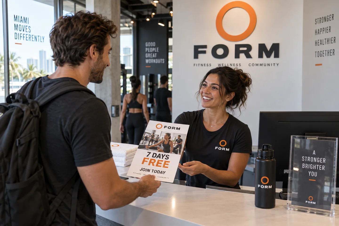 Form fitness trainer sharing a branded introductory offer flyer